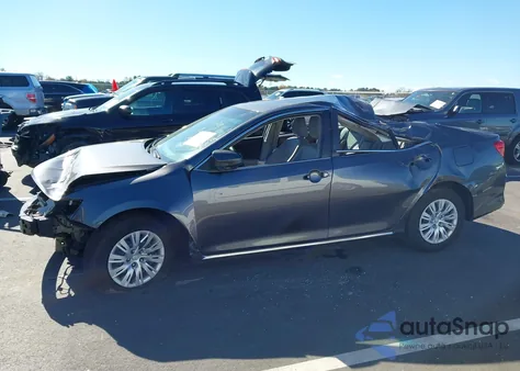 2014 Toyota Camry Le z USA, uszkodzony, nr VIN 4T4BF1FK5ER415032